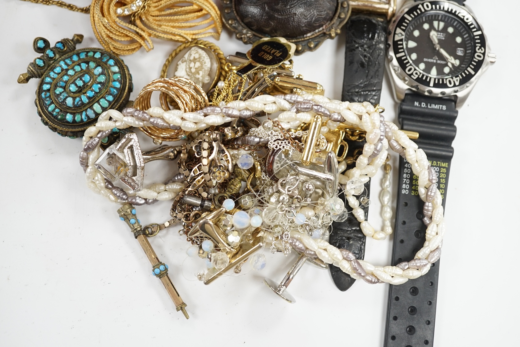 A small group of assorted costume jewellery including cufflinks, rings, brooches etc. together with two wrist watches and a Rolex box. Condition - poor to fair